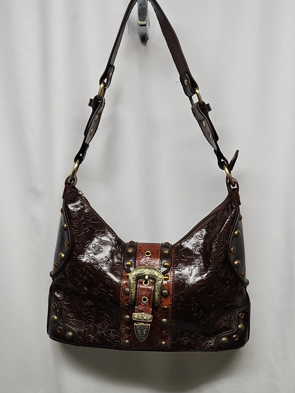 M.C. Embossed Floral Buckle Shoulder Bag in Dark Brown